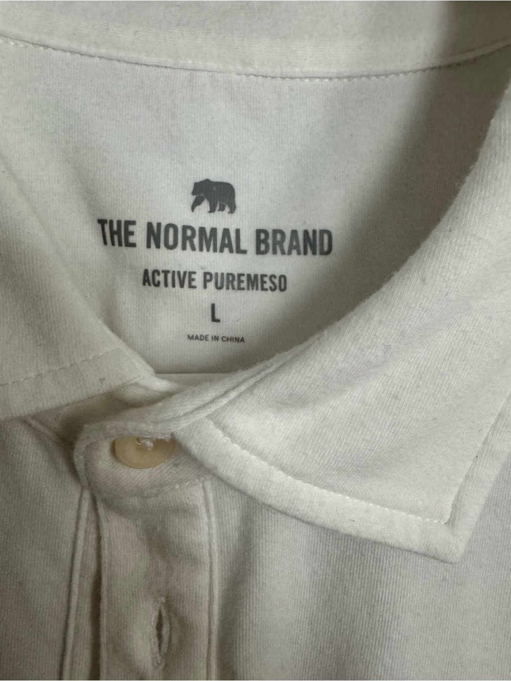 The Normal Brand Cream Polo with Button Placket